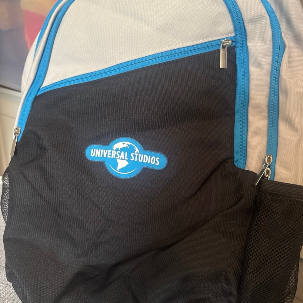 Universal Black and White Backpack with Blue Trim